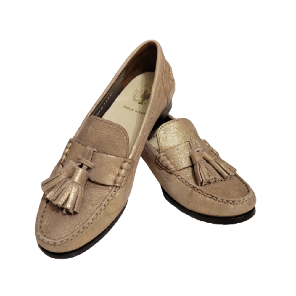 Cole Haan os gold loafer.